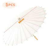 Assorted paper cocktail umbrellas in bright summer colors