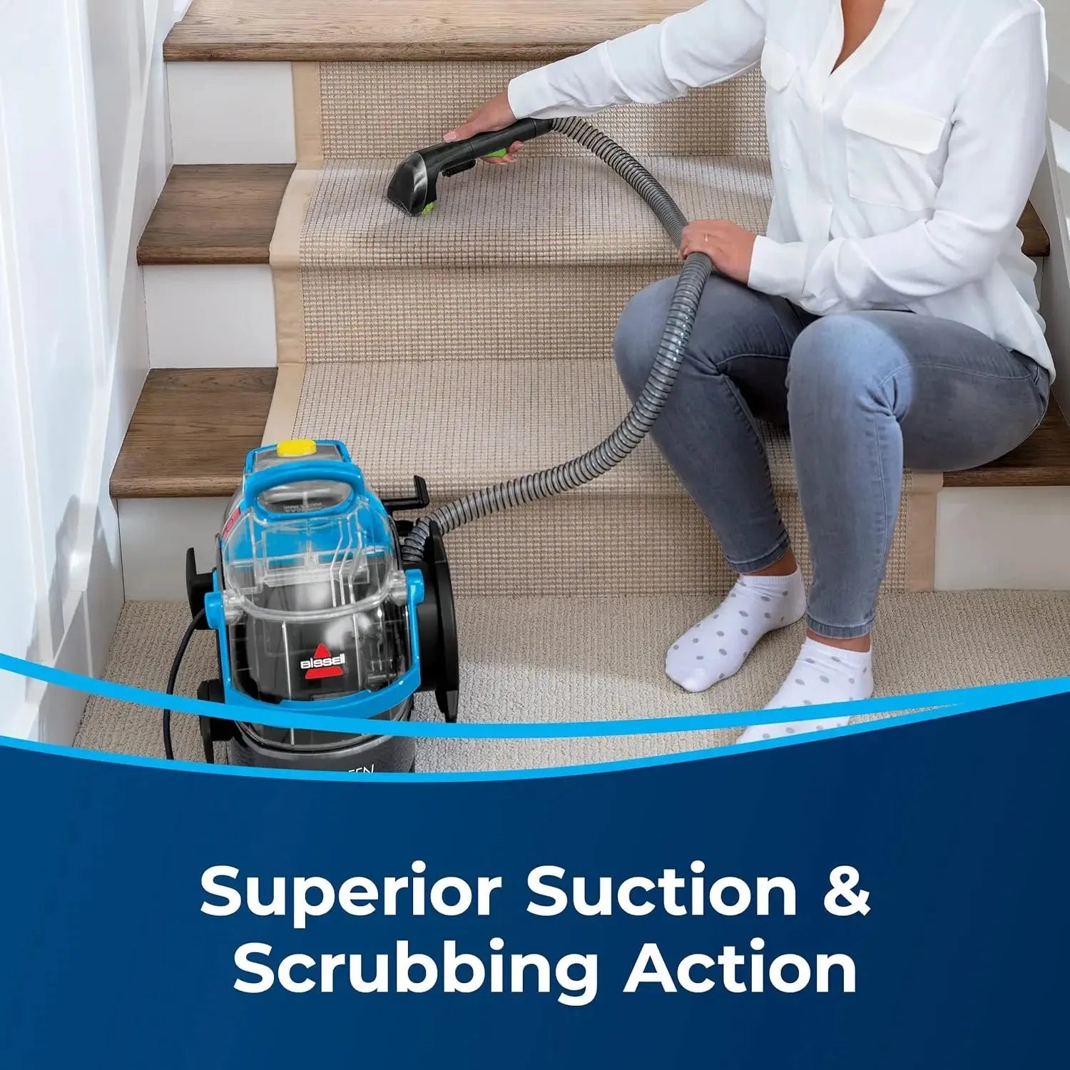 User targeting hard-to-reach corners on stair edges using Green Pro upholstery nozzle