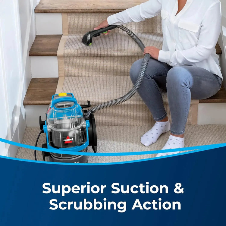User targeting hard-to-reach corners on stair edges using Green Pro upholstery nozzle